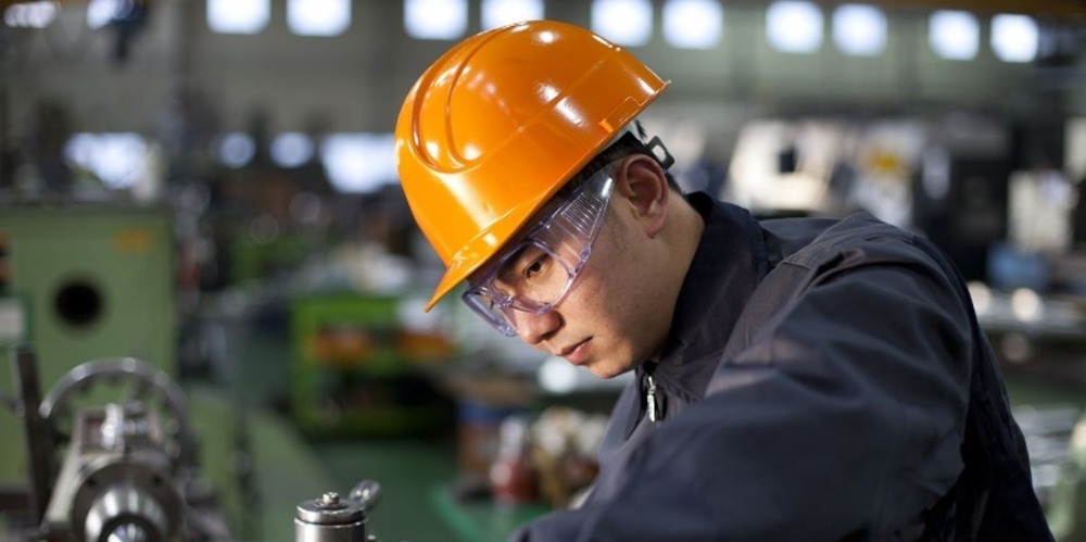 Male Production Operative working in warehouse