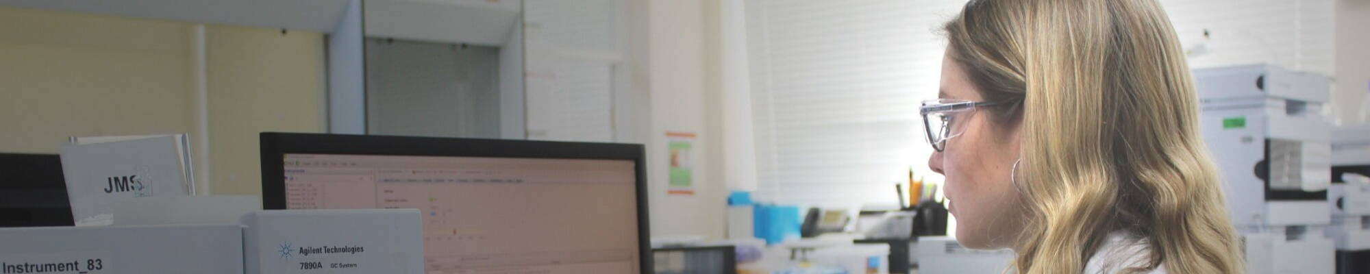 Young woman looking at computer screen