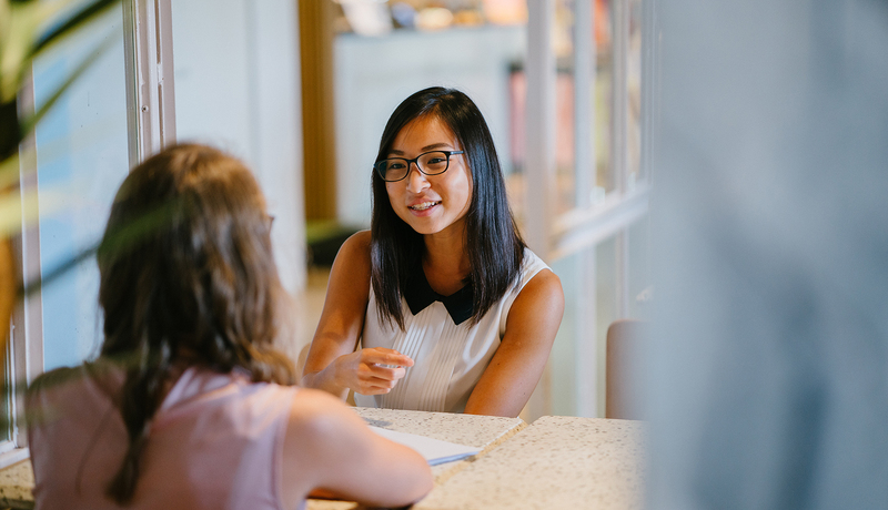 Two women chatting 