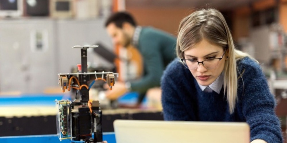 Woman working on computer program